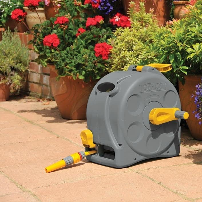 Hozelock 2-in-1 Compact Enclosed Hose Reel Grey Yellow 2415 | With 25Mtr Hose Pipe | Wall Mounted or Free Standing | Ready to Use Manual Rewind Layering System | Garden Patio Lawn Car Wash Watering | Supplied with Complete Fittings