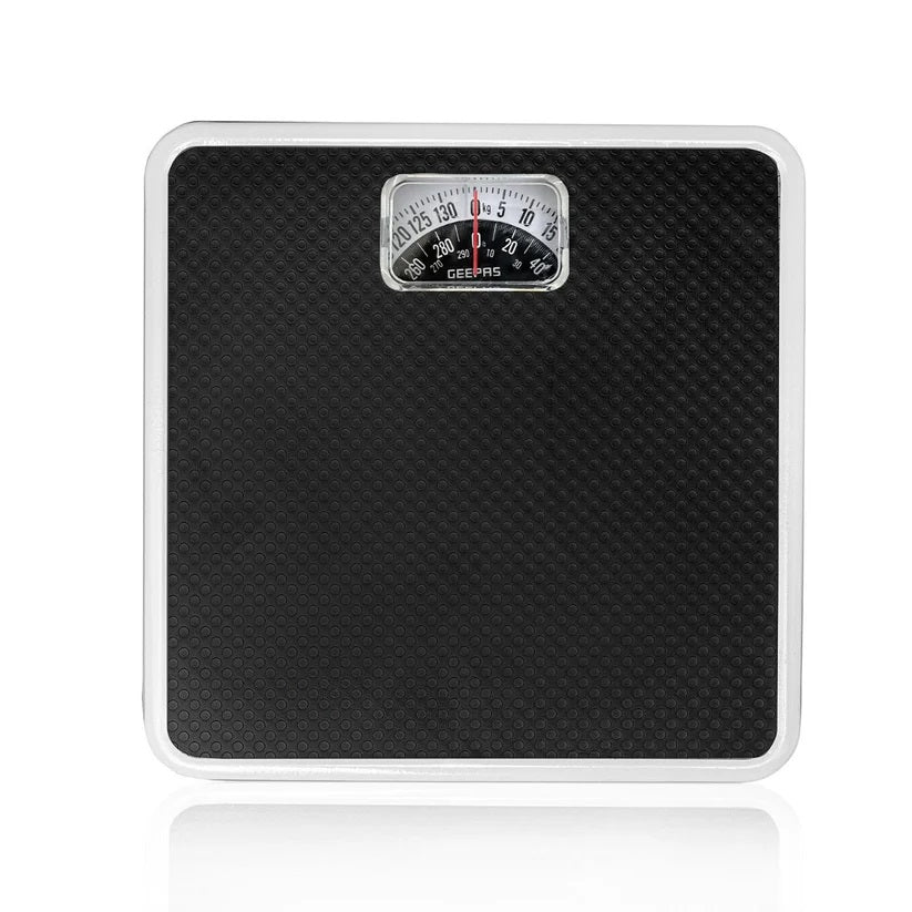 Geepas Mechanical Health Scale Black GBS4169N | Metal Construction | 130Kg Capacity | Large Easy-Read Dial | Calibration Wheel