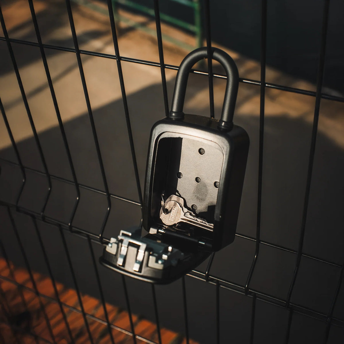 Squire Combination Key Keep 1 PB Black KEYKEEP1 PB | 4 Combination Wheels - 10000 Possible Combinations | No Keys to Lose | Portable Lock Box | Accepts Multiple Keys | Recodable Combination Mechanism | Shutter Door Over Combination Wheels | Soft Touch