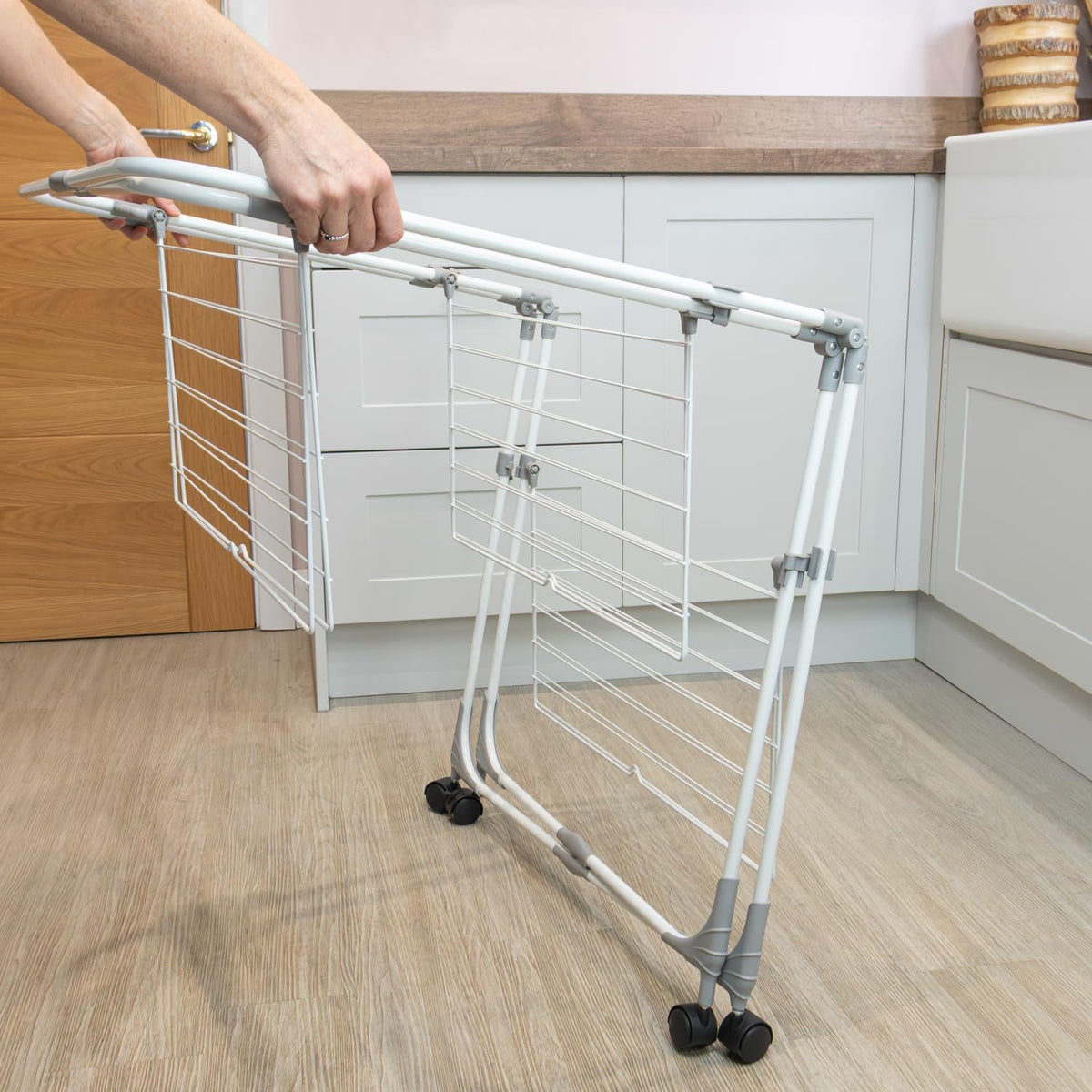 JVL Foldable 3 Tier Drying Rack Space White H135cm x W86cm x D68.5cm 11-066 | 28 Metres Drying Space | 6 Foldable Shelves | Swivel Wheels | Compact Design | Use for Everyday Laundry Essentials and Delicates | For Indoor or Outdoor Use