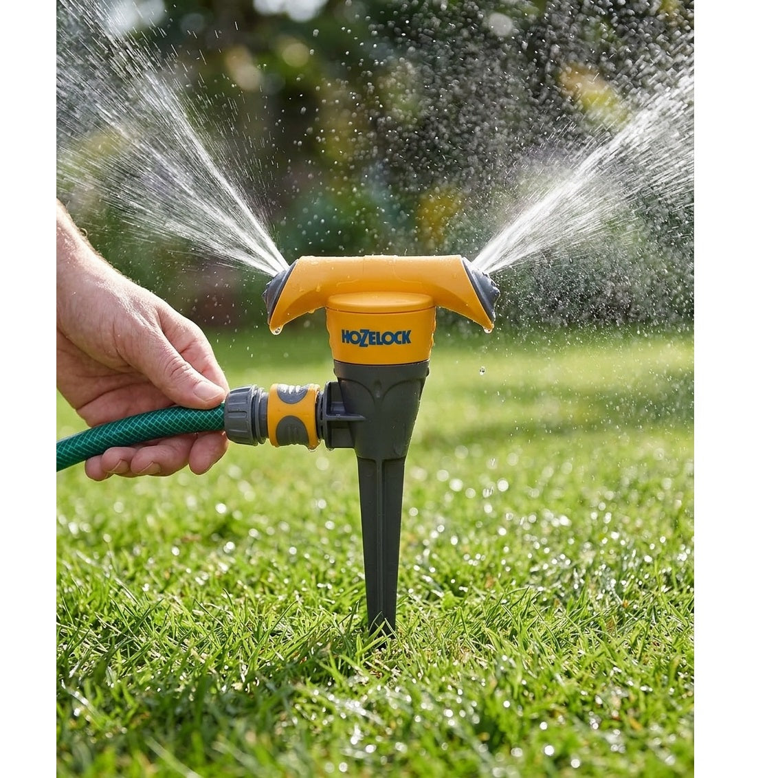 Hozelock Rotating 2-in-1 Jet Spray Garden Lawn Sprinkler Vortex Yellow and Grey 25010 | 177 Metre Square Max Coverage | Heavy Duty Ground Spike Mount with Twin Arm 8-Jet System | Adjustable Jet and Mist Sprayer for Turf and Established Plants | Supplied with Complete Fittings